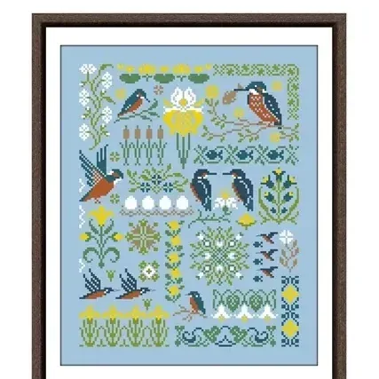 Bird in the Forest cross stitch design DPD245: blue and rust kingfishers among reeds, yellow irises and water lilies on sky-blue fabric