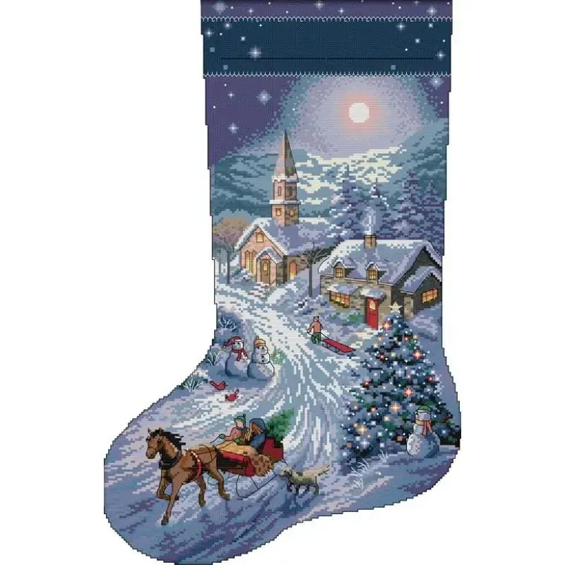 Silent Night Village (C592) Christmas stocking cross stitch design C592: moonlit village with a church steeple, a horse-drawn sleigh, a lit Christmas tree, snowmen and a dog on a snowy lane in blue and violet tones