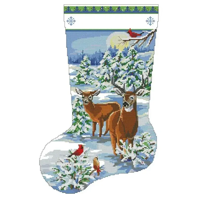 Winter Deer (D930) Christmas stocking cross stitch design D930: two deer standing in a snowy clearing among firs, with a red cardinal perched on a branch above them