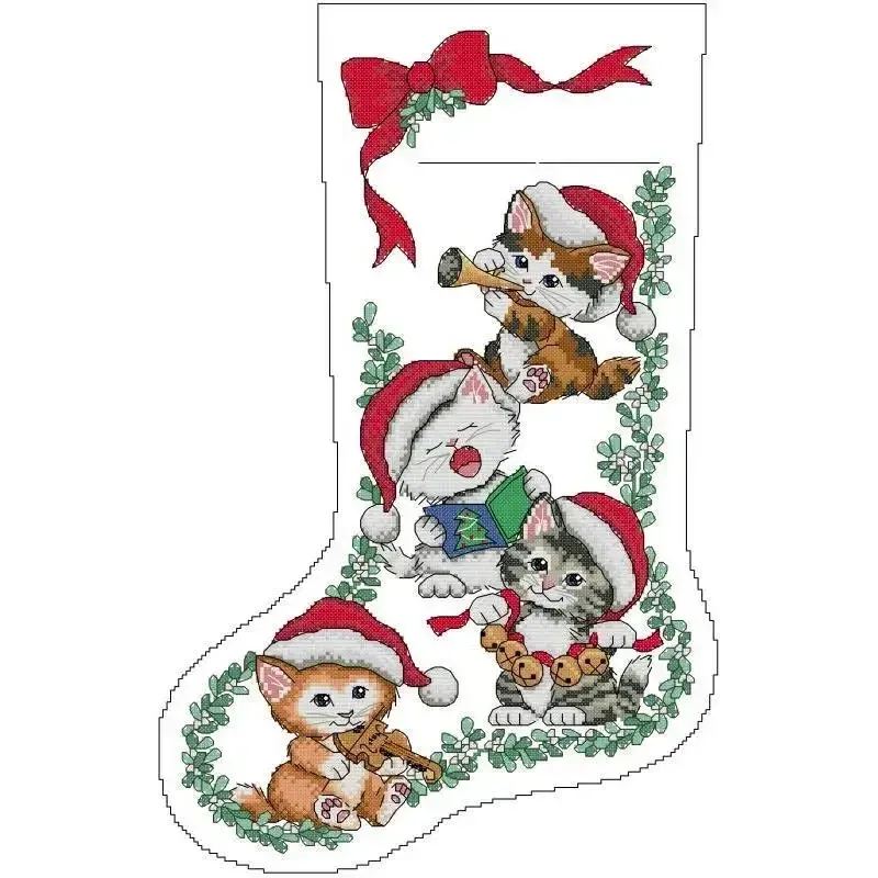 Caroling Kittens (DA569) Christmas stocking cross stitch design DA569: four kittens in Santa hats making music with a trumpet, a carol book, jingle bells and a violin beneath a large red bow