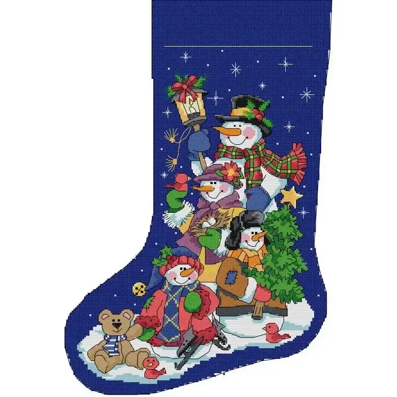 Snowman Family (KB179) Christmas stocking cross stitch design KB179: a family of four snowmen with a lantern, hats and ice skates, joined by a bear cub and red birds on a starry royal-blue sky