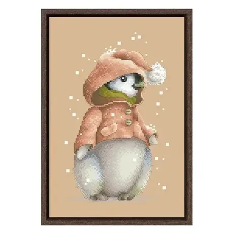 Penguin counted cross stitch design DPD275: a baby penguin in a pink hooded coat with a white pompom, on flaxen fabric with snowflakes
